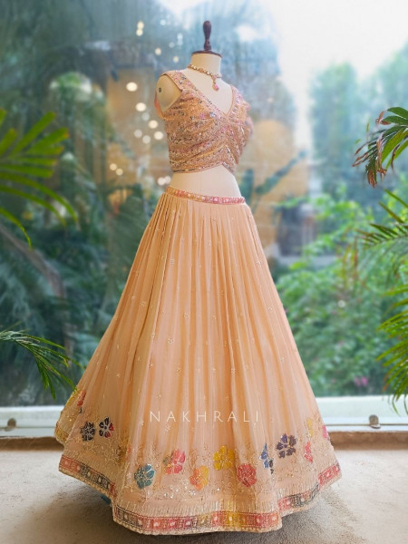 Elara Peach Embroidered Net Lehenga