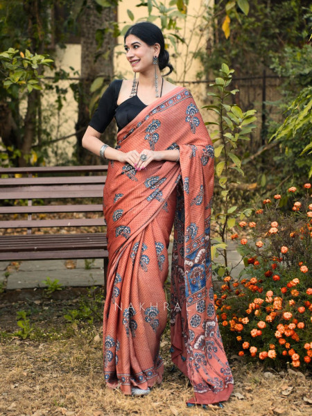 Ira Peach Modal Saree with Traditional Motif Work