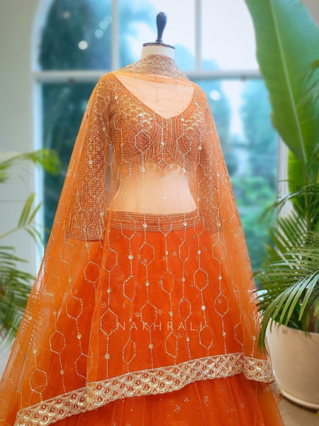 Lustre Enchant Orange Net Lehenga with Heavy Embroidered Blouse