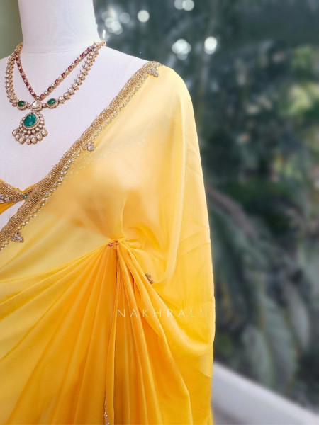 Zyvera Yellow Saree with Cut Dana Edge Work