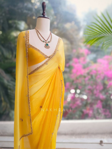 Zyvera Yellow Saree with Cut Dana Edge Work