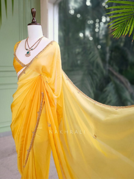 Zyvera Yellow Saree with Cut Dana Edge Work