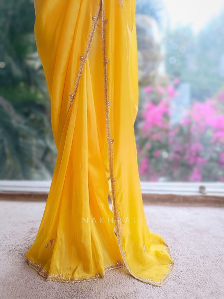 Zyvera Yellow Saree with Cut Dana Edge Work