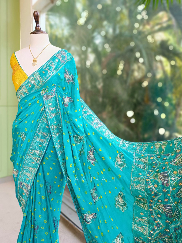 Image of Kavira Rama Green Bandhej Saree with Zari Weaved Border