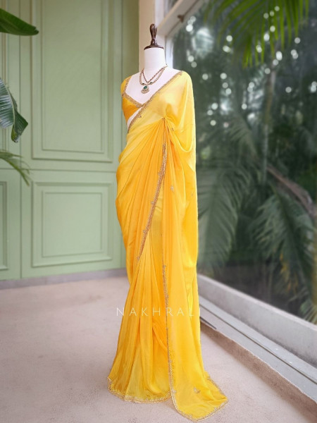 Zyvera Yellow Saree with Cut Dana Edge Work