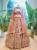 Regal Radiance Orange Embroidered Bridal Lehenga