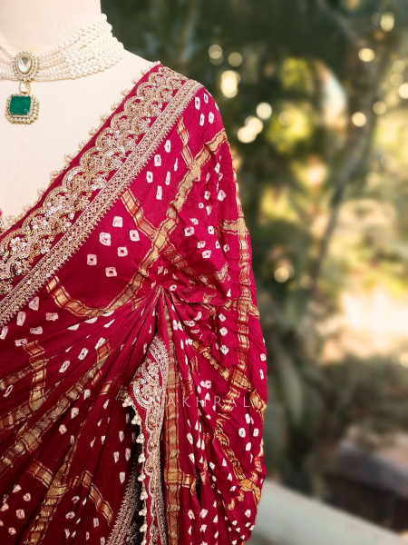 Noor-E-Riwaayat Maroon Bandhani Saree with Zari Border