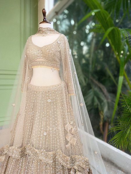 Rishmika Gold Bridal Lehenga with Sequin and Bead Work