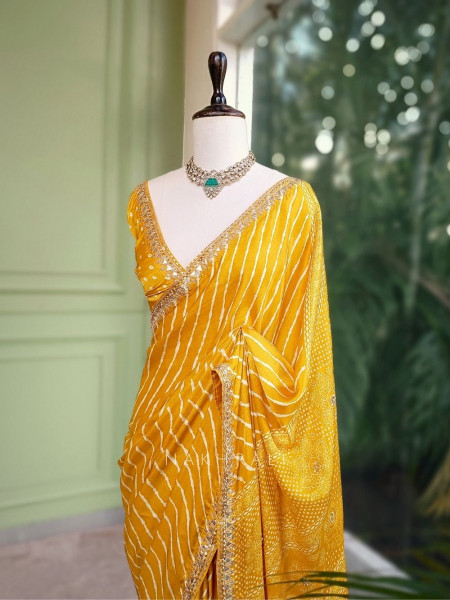 Gulnaar Yellow Saree with Zari Bandhej Work
