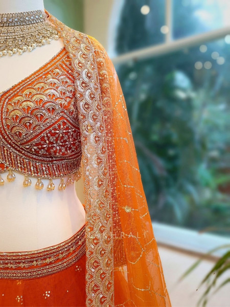 Lustre Enchant Orange Net Lehenga with Heavy Embroidered Blouse