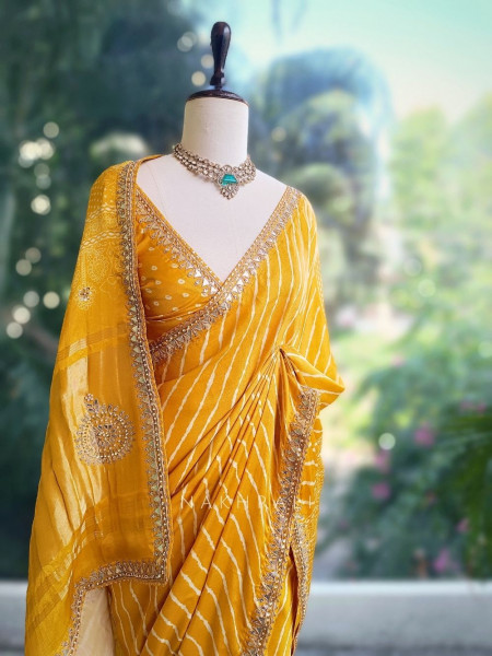 Gulnaar Yellow Saree with Zari Bandhej Work