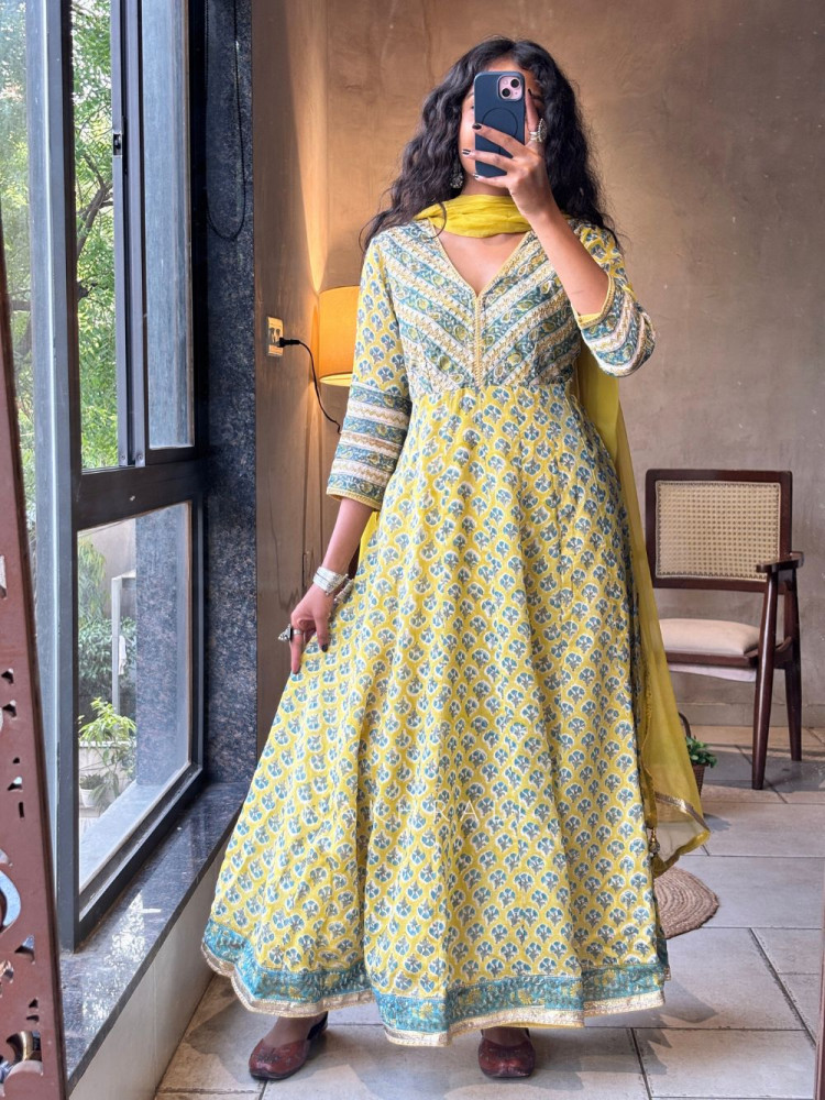 Image of Madhavi Yellow Cotton Anarkali Suit Set With Floral Print