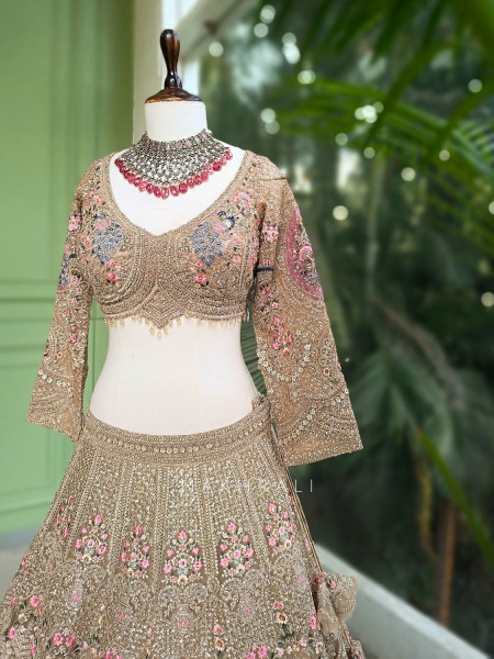 Rukmira Gold Bridal Lehenga with Floral Embroidery