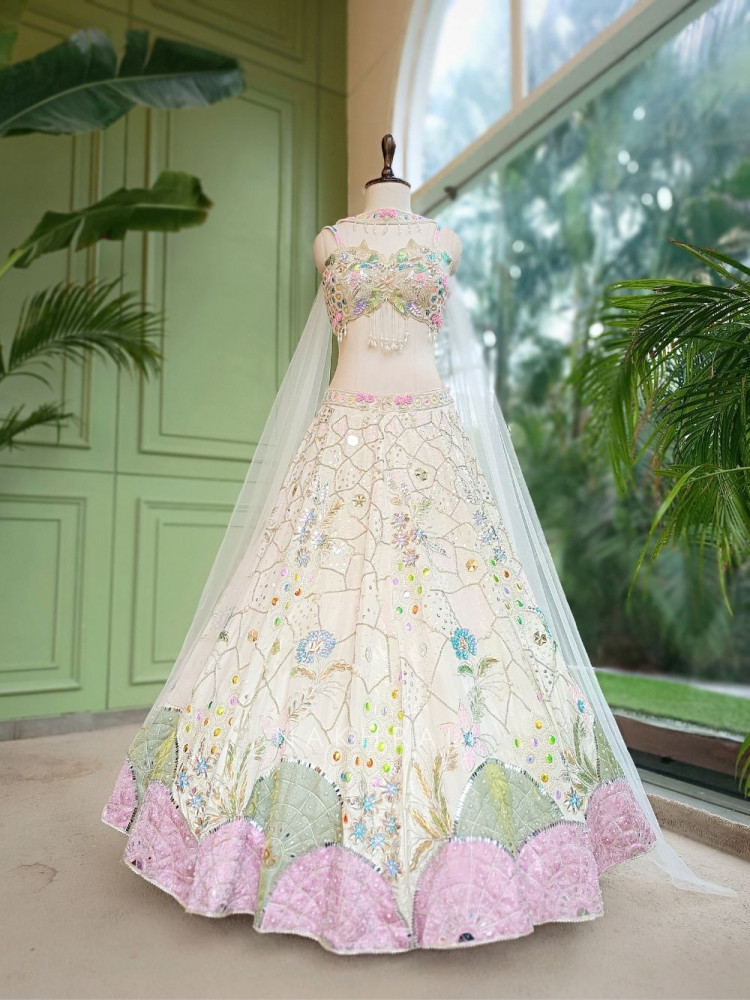 Image of Ishvika Off-white Slub Silk &amp; Tulle Carnival Lehenga Set