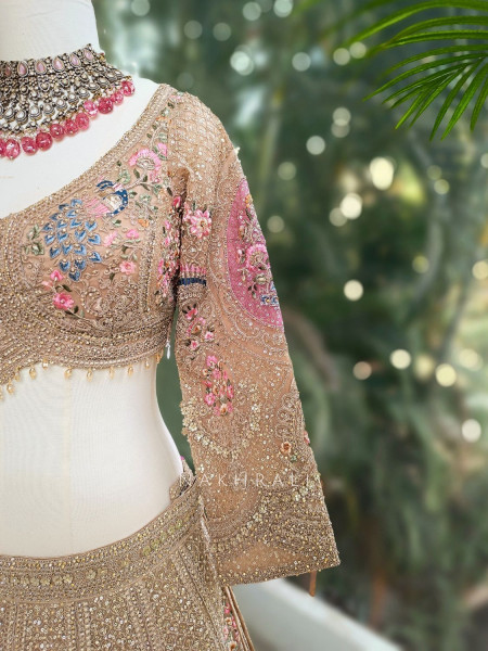 Rukmira Gold Bridal Lehenga with Floral Embroidery