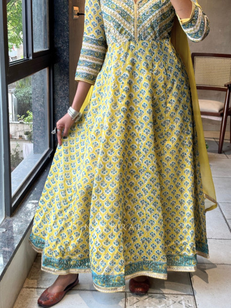 Madhavi Yellow Cotton Anarkali Suit Set With Floral Print