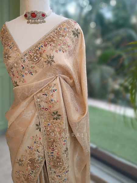 Varnikaa Cream Tissue Saree with Multicolor Resham & Zardozi Embroidery