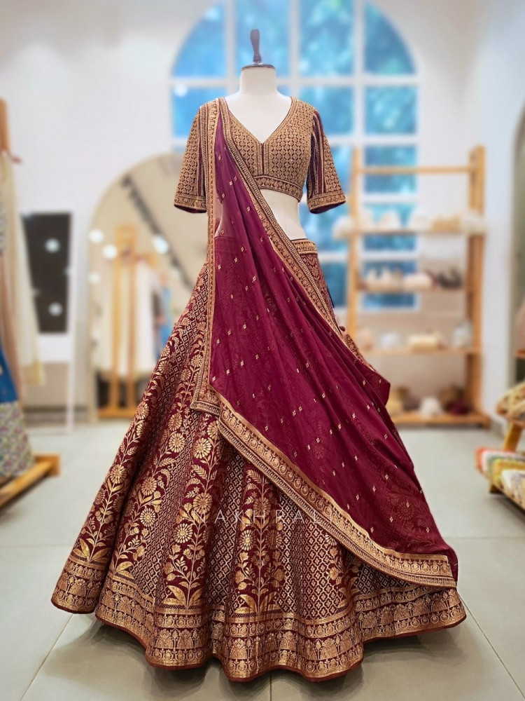 Image of Veerangana Maroon Silk Bridal Lehenga with Zari Weave