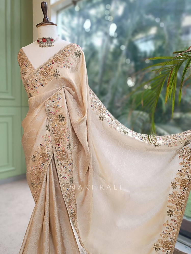 Image of Varnikaa Cream Tissue Saree with Multicolor Resham &amp; Zardozi Embroidery