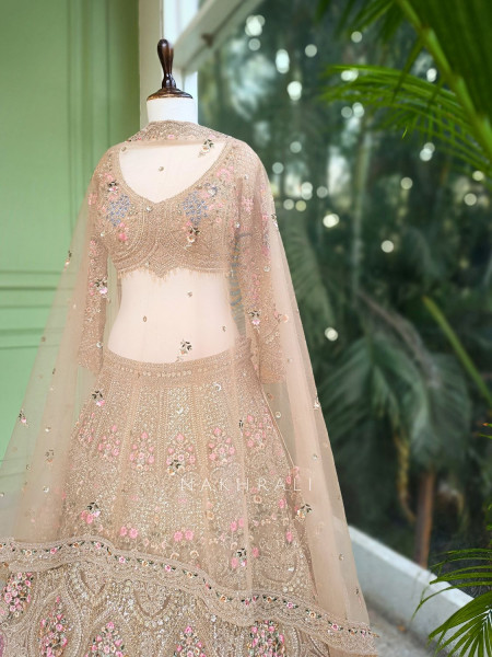 Rukmira Gold Bridal Lehenga with Floral Embroidery