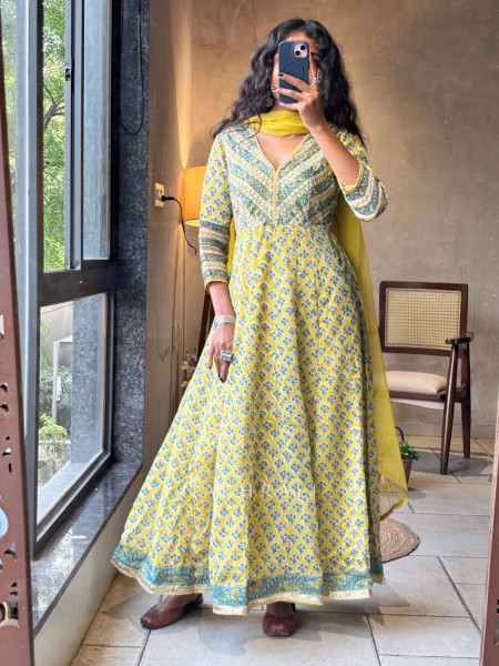 Madhavi Yellow Cotton Anarkali Suit Set With Floral Print