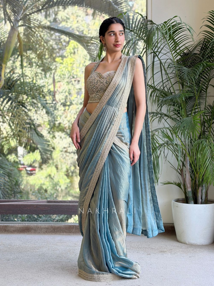 Image of Vayora Teal Blue Drape Saree with Embroidered Blouse and Border Work