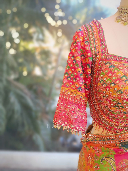 Tamaswini Orange Crepe Saree with Stone, Zari & Sequin Work