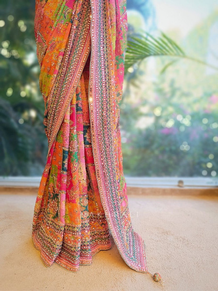 Tamaswini Orange Crepe Saree with Stone, Zari & Sequin Work