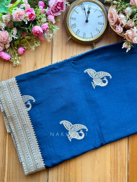 Tavira Teal Blue Saree with Broad Border and Unstitched Blouse Piece