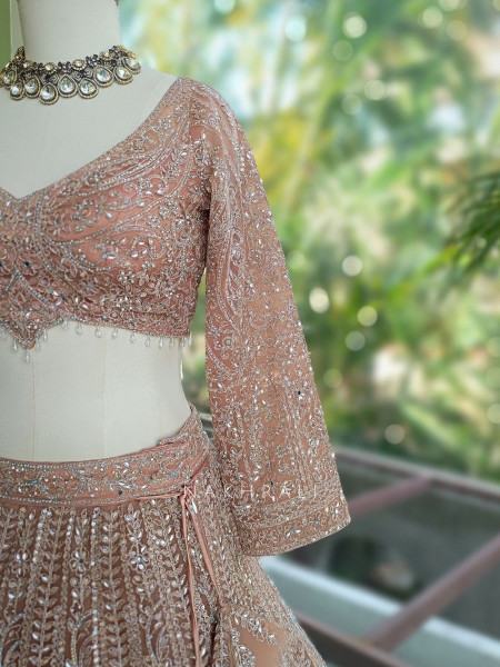 Venoora Peach Bridal Lehenga with Zari and Sequin Work