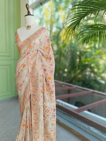 Kasturi Off White Ikat Weaved Saree with Running Blouse Piece