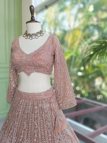Venoora Peach Bridal Lehenga with Zari and Sequin Work