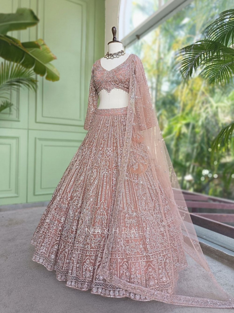 Image of Venoora Peach Bridal Lehenga with Zari and Sequin Work