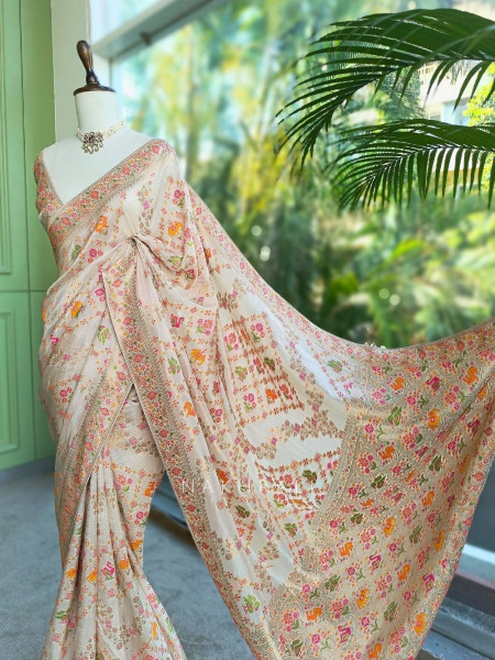 Kasturi Off White Ikat Weaved Saree with Running Blouse Piece