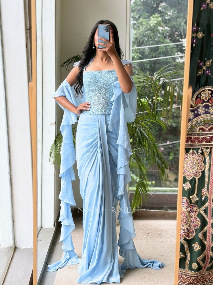 Image of Shimmer Glow Sky Blue Crop Top Skirt Set With Sequin Corset &amp; Ruffle Cape Detail