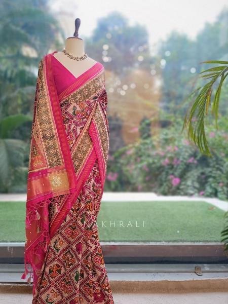 Varnamala Red Patola Silk Saree with Multicolor Elephant & Peacock Motifs and Zari Border