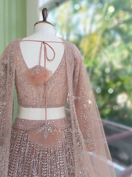 Venoora Peach Bridal Lehenga with Zari and Sequin Work