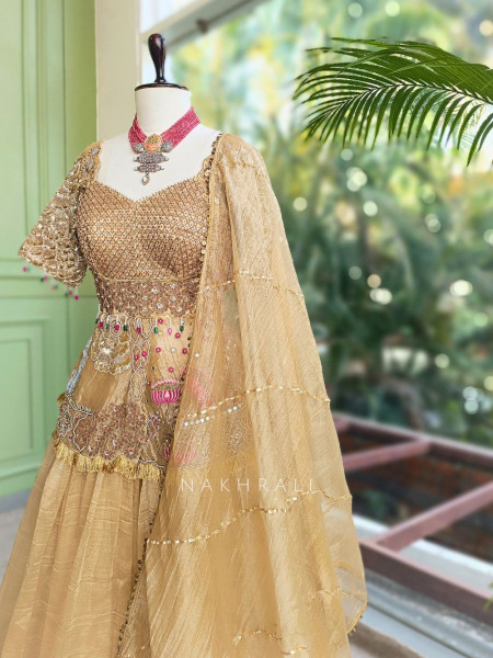 Kanisha Golden Indo-Western Lehenga Set with Embroidered Peplum