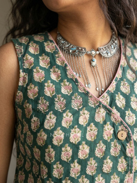 Flexora Green Printed Sleeveless Top with Overlap Neck Detail