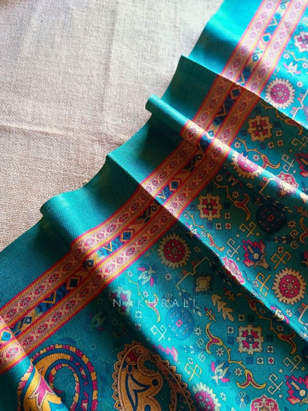 Heritage Rama Green Woolen Printed Dress Material