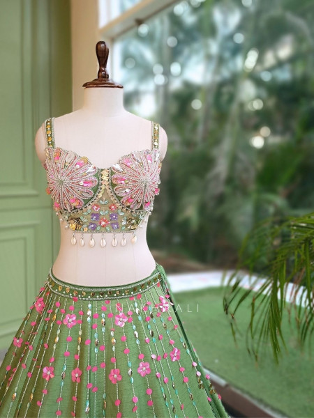Amoret  Green Raw Silk & Tulle Carnival Lehenga Set With 3D Floral, Cutdana & Cowrie Work