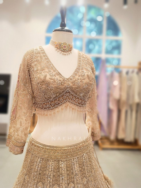 Seraphine Beige Lehenga Set with Zari and Sequin Work