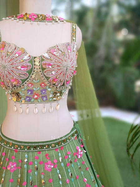 Amoret  Green Raw Silk & Tulle Carnival Lehenga Set With 3D Floral, Cutdana & Cowrie Work