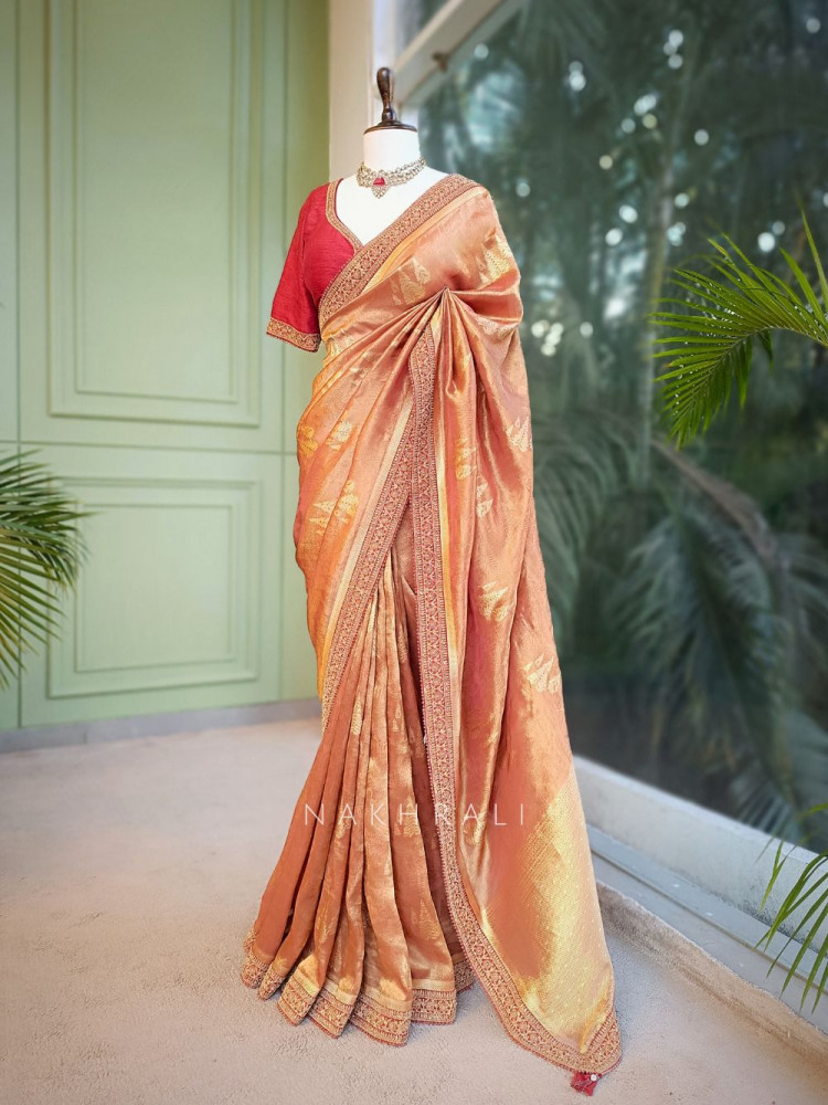 Image of Golden Peach Banarasi Saree with Zari Weave &amp; Embroidered Border