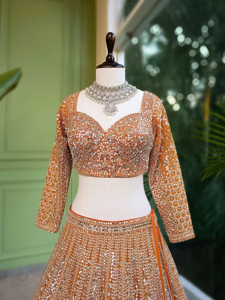 Sitara Orange Net Lehenga with Mirror, Zari and Bead Embellishments