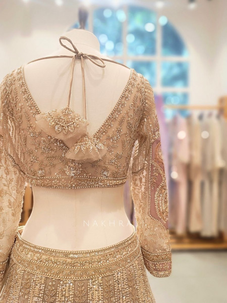 Seraphine Beige Lehenga Set with Zari and Sequin Work