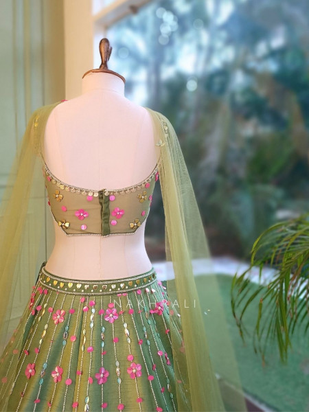 Amoret  Green Raw Silk & Tulle Carnival Lehenga Set With 3D Floral, Cutdana & Cowrie Work