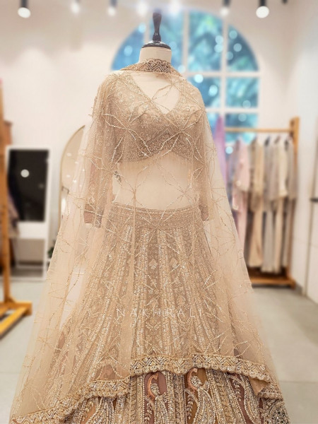 Seraphine Beige Lehenga Set with Zari and Sequin Work