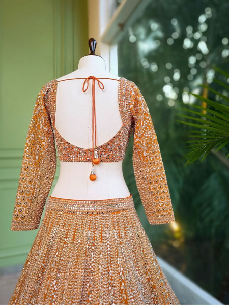 Sitara Orange Net Lehenga with Mirror, Zari and Bead Embellishments