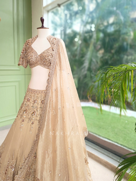 Tvarika Beige Tissue Organza Bridal Lehenga With Zardozi Tilla & Scalloped Work